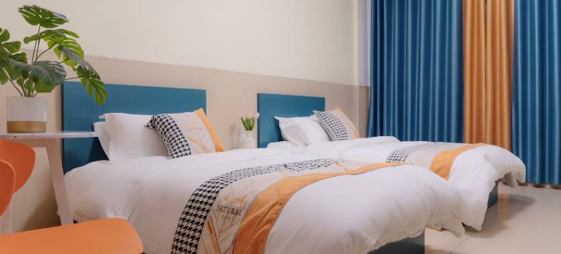 咪弟精选民宿(上街大学城金屿地铁站店)图片