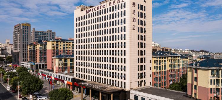 信阳宝鹏广场美居酒店图片