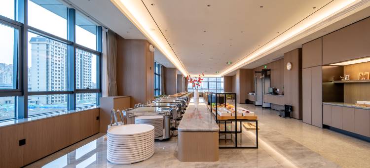 华悦凯旋大酒店(伟业大厦新城公交站店)图片