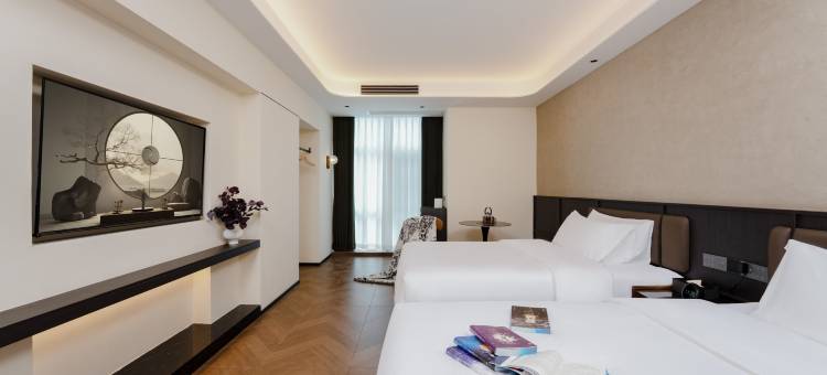 四季酒店(康建城西南医科大学附属医院店)图片