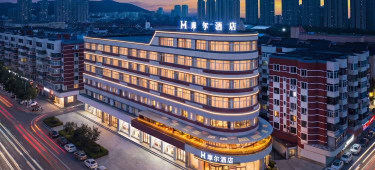 摩尔酒店(民族大学拾贝湾梦幻水乐园店)图片