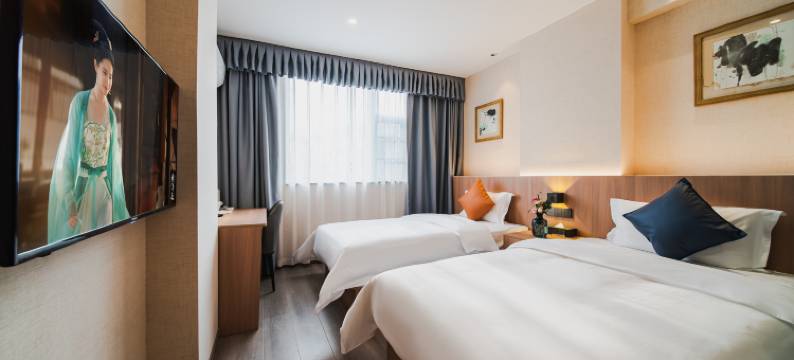 曼客阳光酒店(四川护理职业学院万达广场店)图片