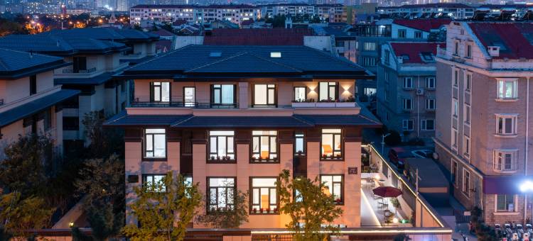 花筑·威海爱丽丝民宿(海上公园店)图片