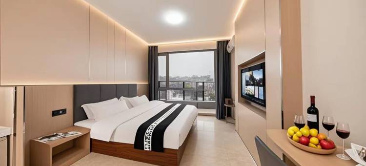 曼朵轻奢智能影音酒店(威海火炬八街国际海水浴场店)图片