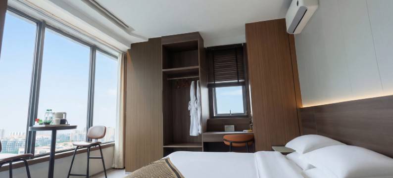 壹休·智能民宿(市行政中心地铁站店)图片