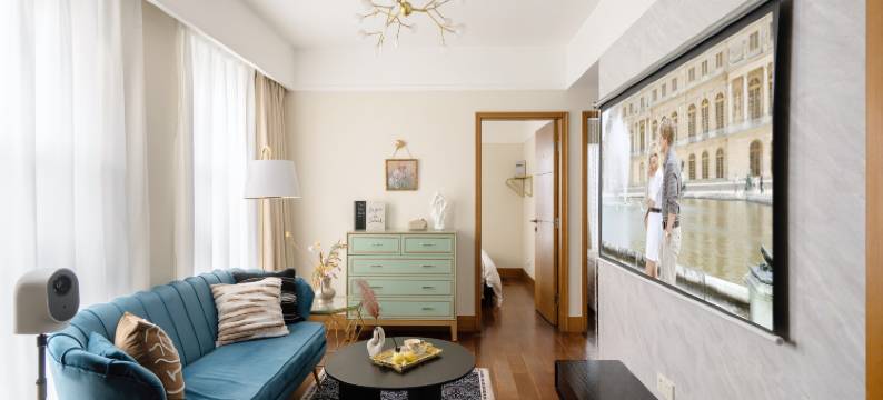 漫漫设计师民宿(观音桥步行街协信中心店)图片