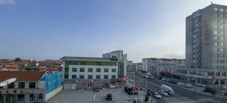 荣成东海岸商务宾馆(成山镇西霞口动物园店)图片