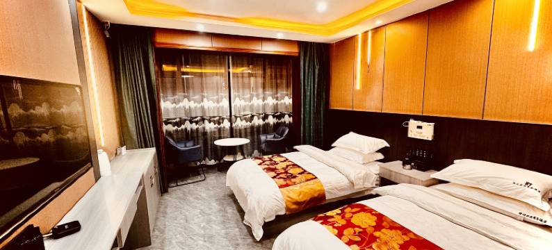 札达隆迈家族商务酒店图片