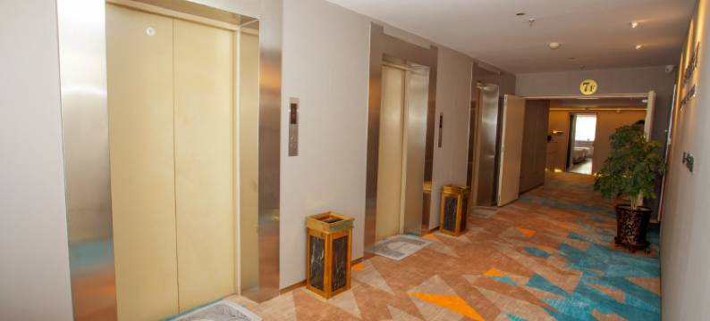 满洲里龙都智享酒店公寓(华都大厦店)图片