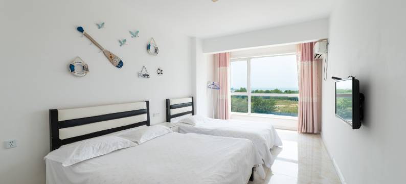 长岛朝阳观海自助公寓图片