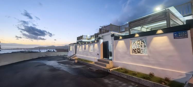 荣成潮生阁海景民宿(西霞口动物园成山头风景区店)图片
