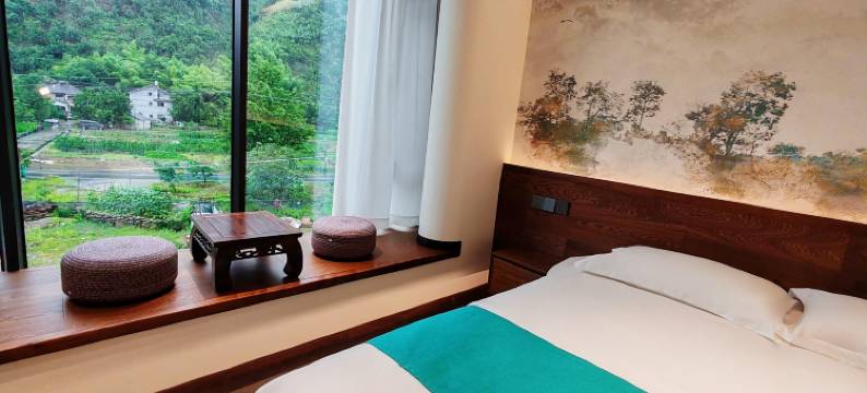 杭州临安龙井源民宿(龙井峡漂流三渡山地运动公园店)图片