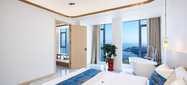 荣成凤栖海岸假日酒店(西霞口动物园店)图片