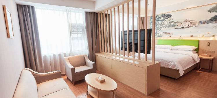 维｜也钠云境美居•静逸轻居•设计城市酒店(淮滨人民政府淮滨站店)图片