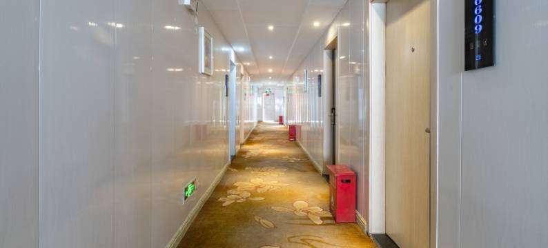 新港商务宾馆(信阳火车站天润广场店)图片