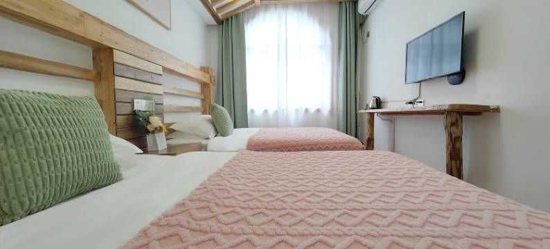 只为等你客栈(张家界火车站天门山索道站店)图片