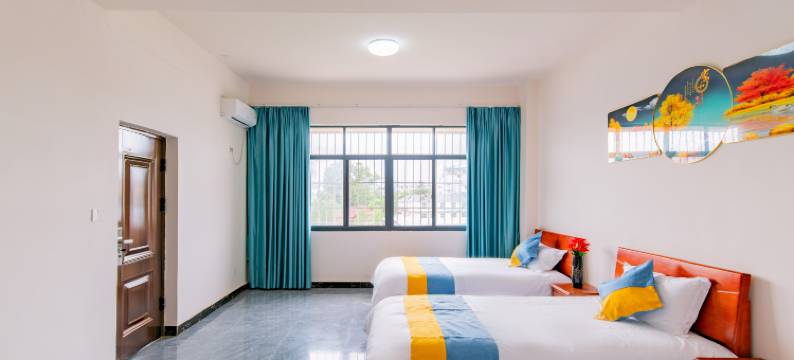 西双版纳景洪城悦·日月吉祥旅居民宿(嘎洒机场高铁站店)图片