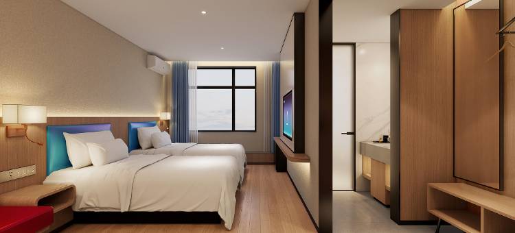 艾居家迎酒店(盖州市公安局店)图片