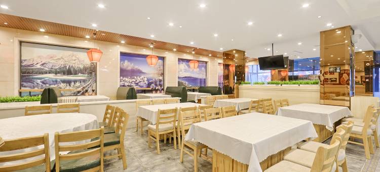 梓里酒店(哈尔滨江北大学城地铁站店)图片