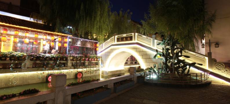 弥勒喜乐院酒店(湖泉水乡旅游度假区店)图片