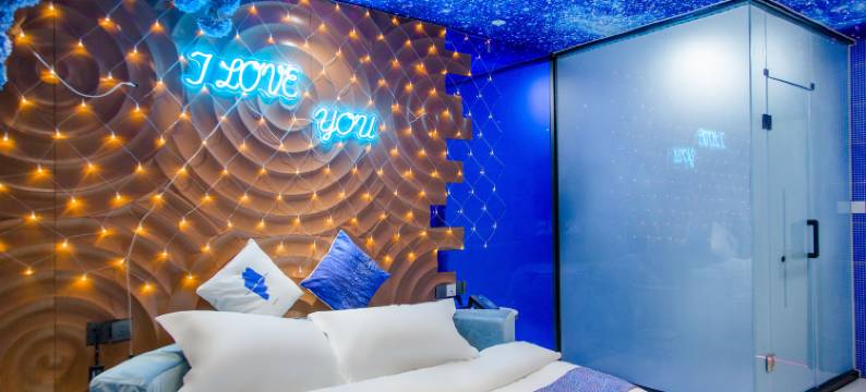 慕鸣主题酒店(庆云石佛大街红磡龙著店)图片