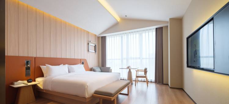 桔作酒店(新乡东站市政府店)图片