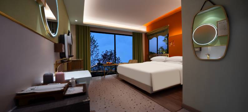 芊芊芒果树酒店(乐山大佛东大街美食街店)图片