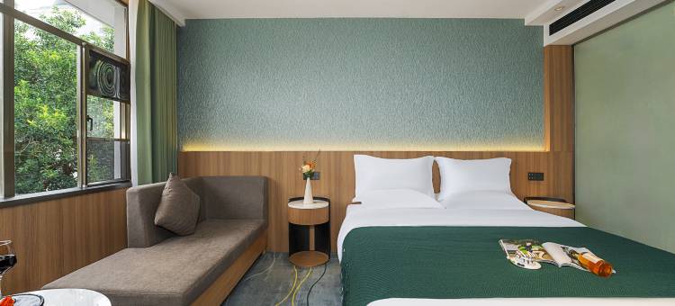 西双版纳景洪美凯精品酒店(孔雀湖热带花卉园店)图片