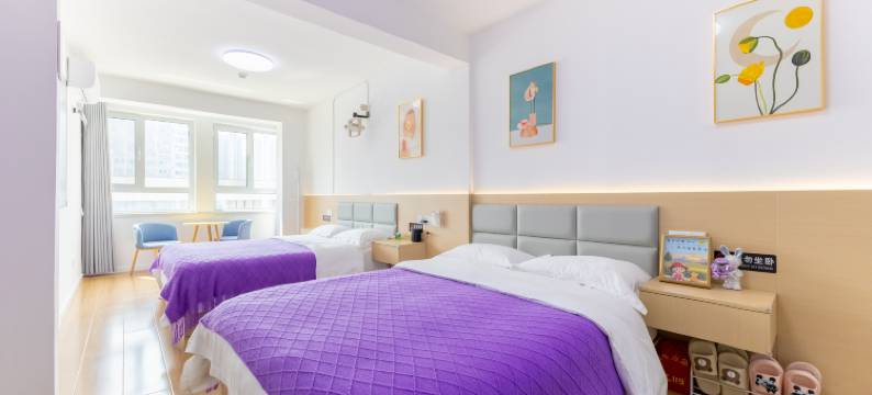 合悦观海影音酒店(烟台大学国际博览中心店)图片