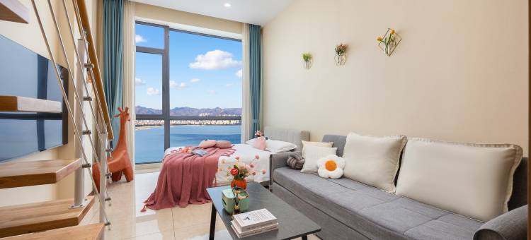 雅居海LOFT海景公寓(威海站华发九龙湾店)图片