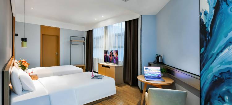 曼天雨酒店(武汉友谊大道湖北大学地铁站店)图片