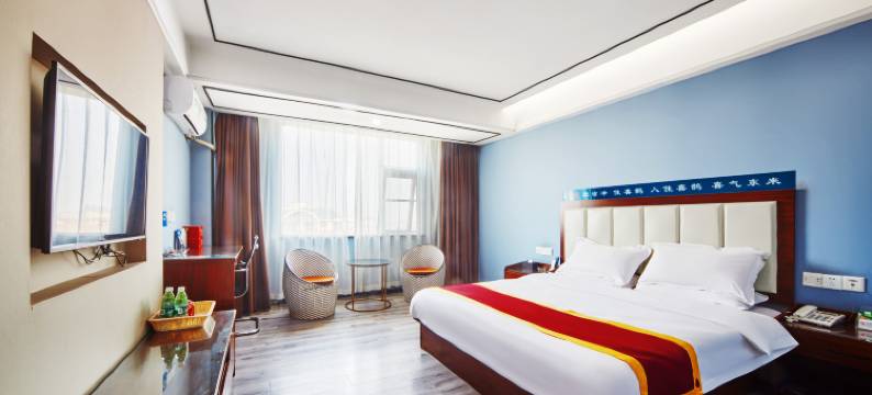 喜鹊主题酒店(郸城人民政府中心汽车站店)图片