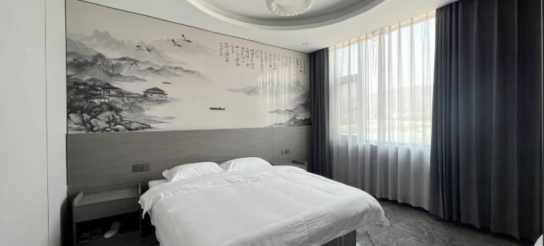 弥勒花园宾馆(竹园镇店)图片