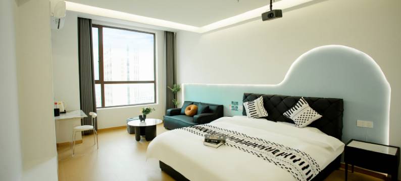 只有半朵设计师民宿(邹城百盛财富中心店)图片