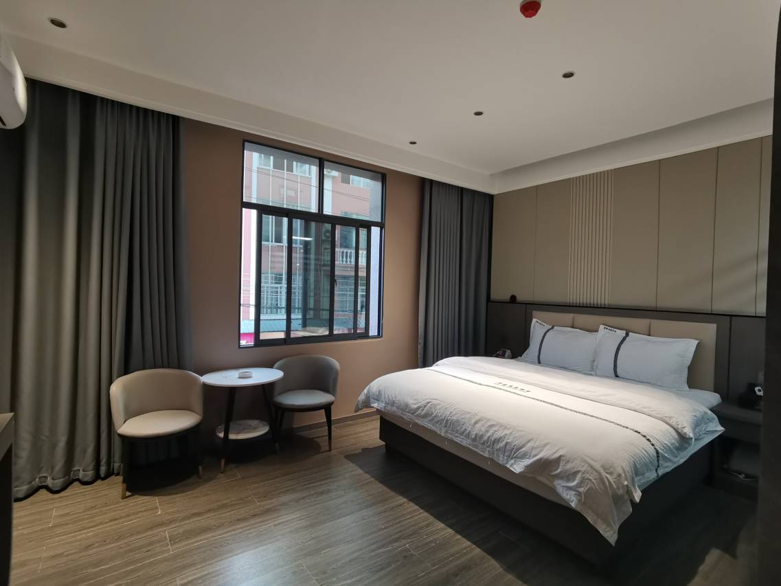 华哲酒店(蒙自市人民医院店)