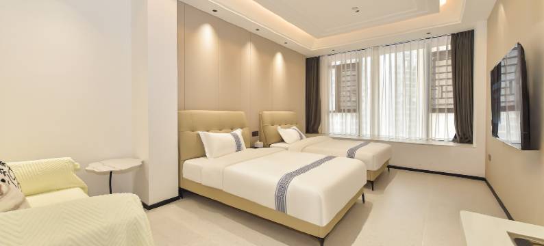 鸣茜·Mia美宿(凯里方圆荟购物中心店)图片