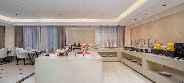 维也纳酒店(盘州南湖公园银杏广场店)图片