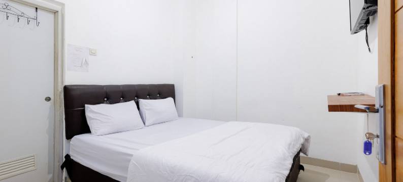 JJ豪斯米特拉红门酒店(JJ House Mitra RedDoorz)图片