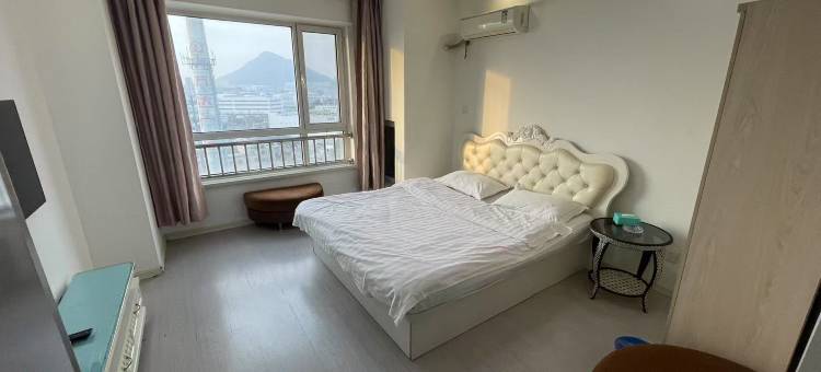 逸居民宿(开发区万达广场店)图片