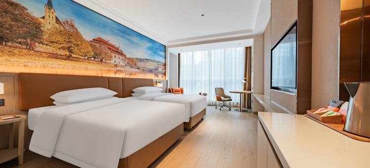 维也纳酒店(汽博中心金童路地铁站店)图片