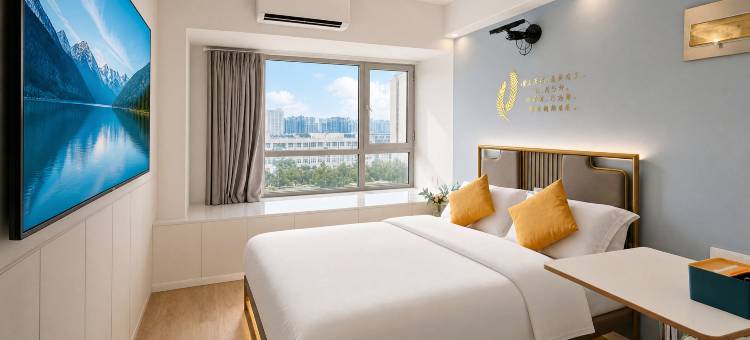 筑梦观影酒店(郑州大学新校区河南工业大学地铁站店)图片