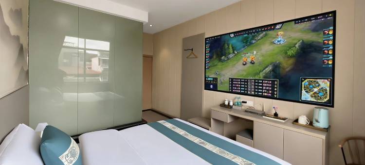 遇程影趣·Luxury电玩公寓(河池环江店)图片