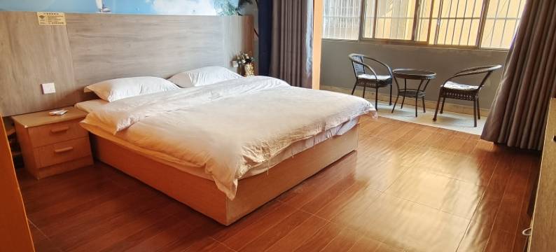 芒果御园酒店(景洪曼听公园店)图片