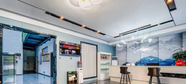 客的家影院酒店(信丰火车站店)图片