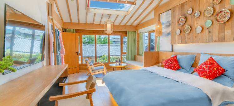 安居·日照金山设计师观雪山全景屋顶咖啡美宿丨静谧花园图片