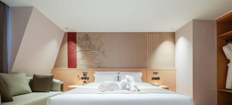 爽逸同呈酒店图片