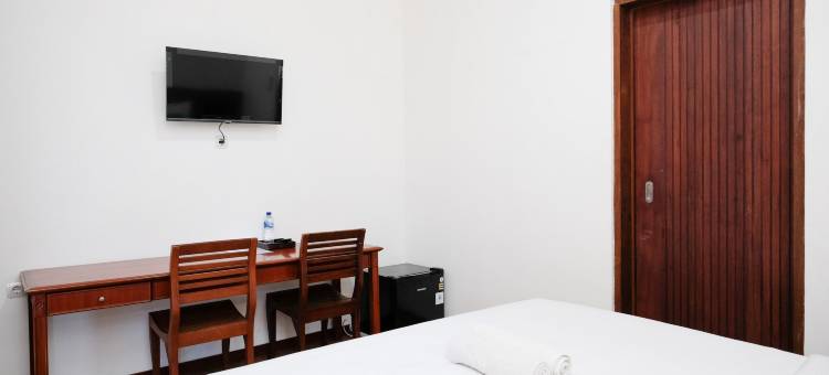 Urbanview Hotel Arta Guna Casa图片