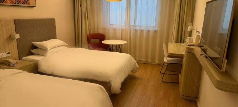 固镇浪漫旅程酒店(投资大厦店)图片