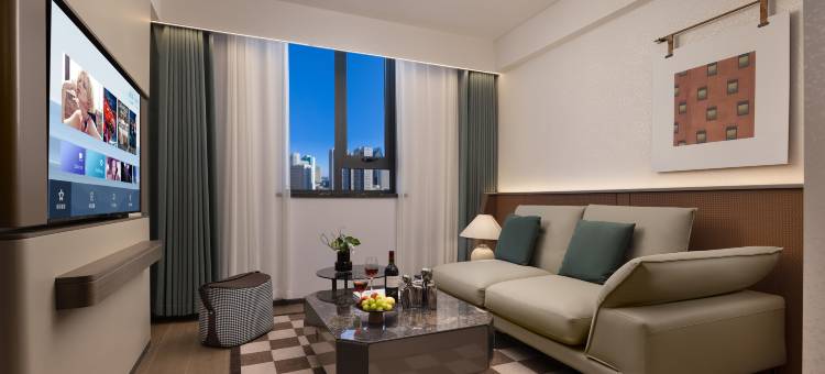 阜阳•橙子WARMWARMMOMMOMKIDSDESIGN酒店(颍州里二里井夜市店)图片