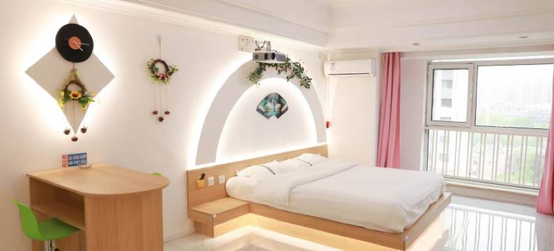 金巢家庭公寓(哈尔滨西站哈西万达广场店)图片